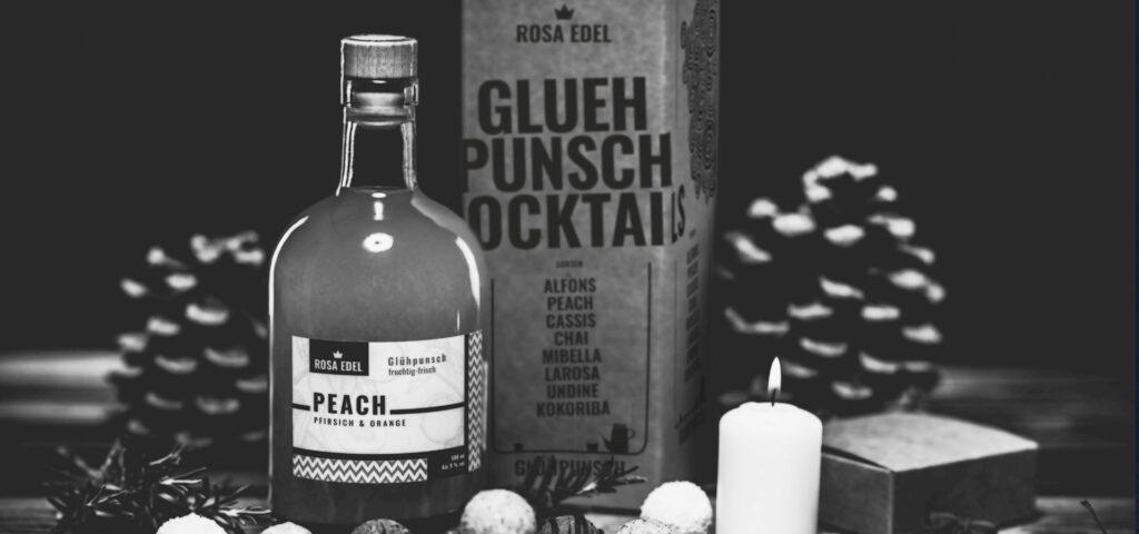 Rosa Edel Weihnachtsgeschenkbox mit Glühpunsch und Pralinen